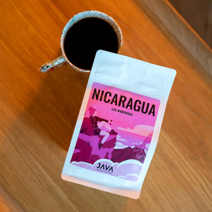 JAVA Coffee Nicaragua Las Morenitas kawa specialty – opakowanie kawy i filiżanka czarnej kawy widok z góry